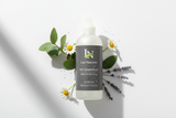 pet shampoo with Lux Natures logo with green leaf