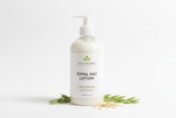 16 oz plastic bottle with Total Oat lotion with Lux Natures logo with green leaf